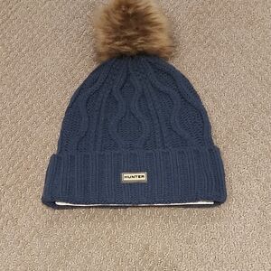 Hunter Blue Knit Beanie with Tan Pom
